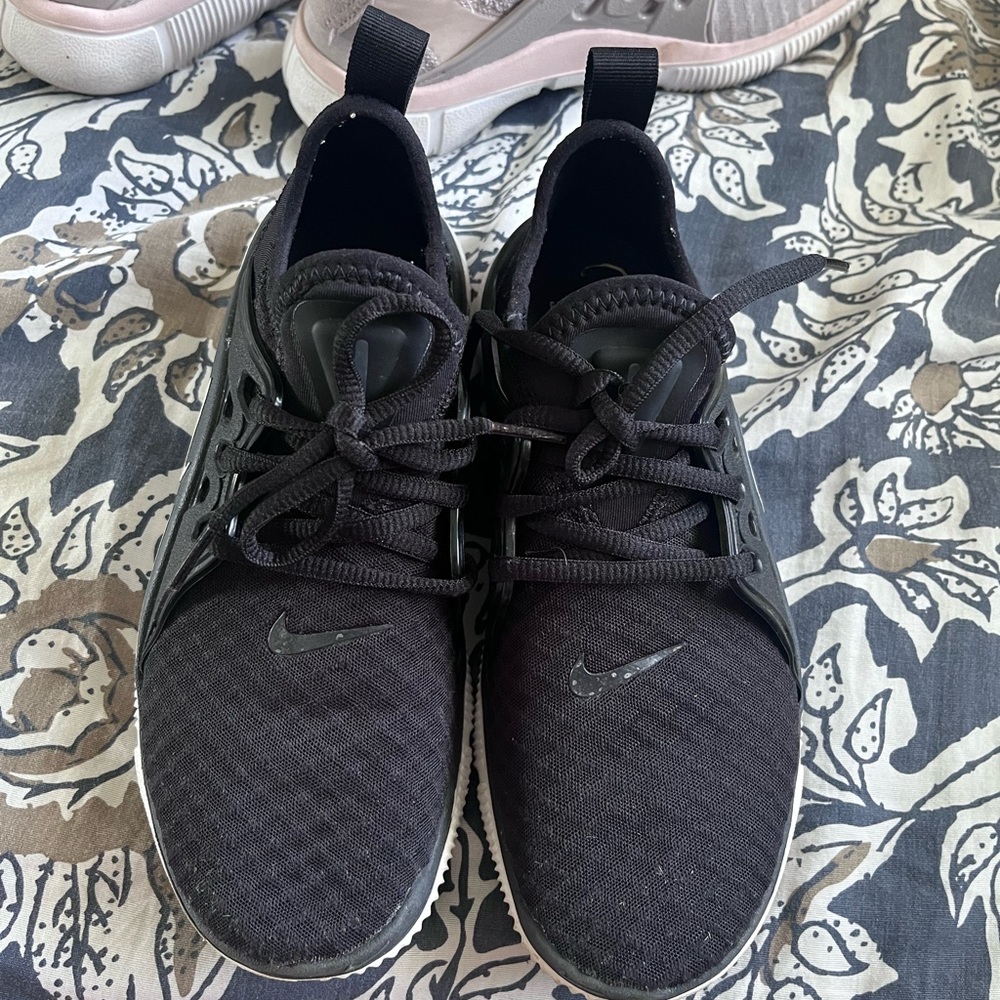 Black and white Nike running shoes